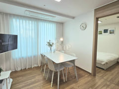 Fully furnished two-bedroom apartment right n 1th image