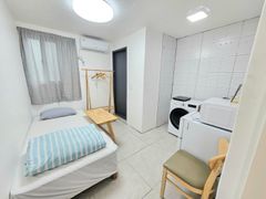 Clean white and gray studio apartment 0th image