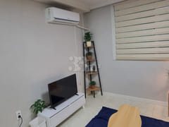 It is a neat, newly built room. 5th image