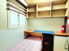 Unit 407: Studio-style room with an exterior  1th image