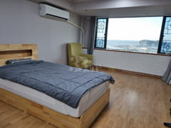 Comfortable room with an ocean view 1th image