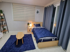 It is a neat, newly built room. 2th image