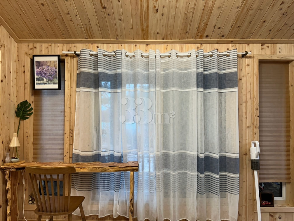 A room with a pretty garden in the forest. 7th image