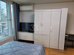 A room spacious enough for two people. 4th image
