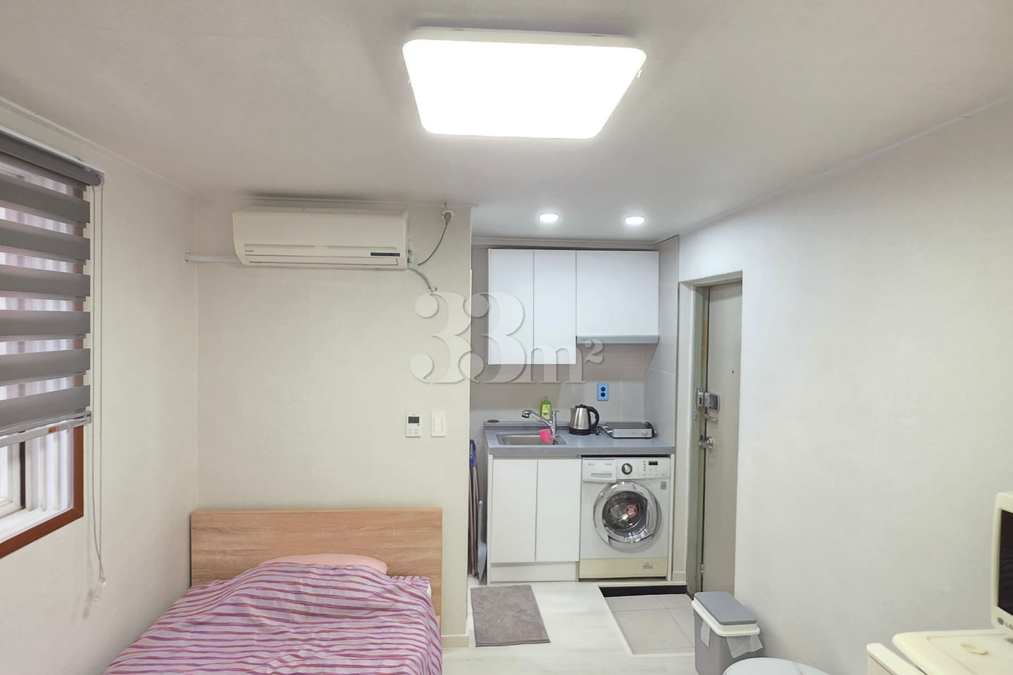 It is a neat studio apartment. 0th image