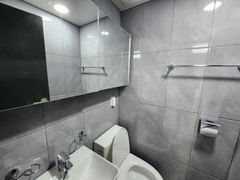 Clean, modern white studio apartment 3th image
