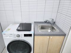 Clean white and gray studio apartment 4th image