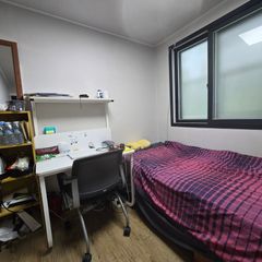 Male student looking for a studio apartment n Unit Image