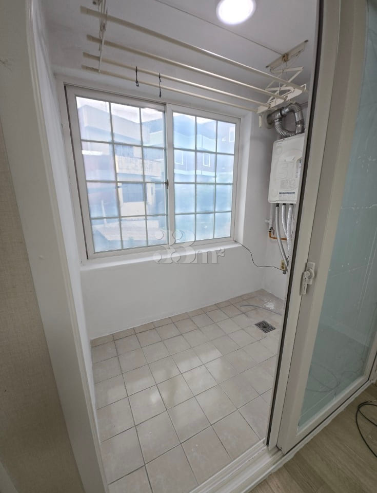 A stylish and neat studio apartment 5th image
