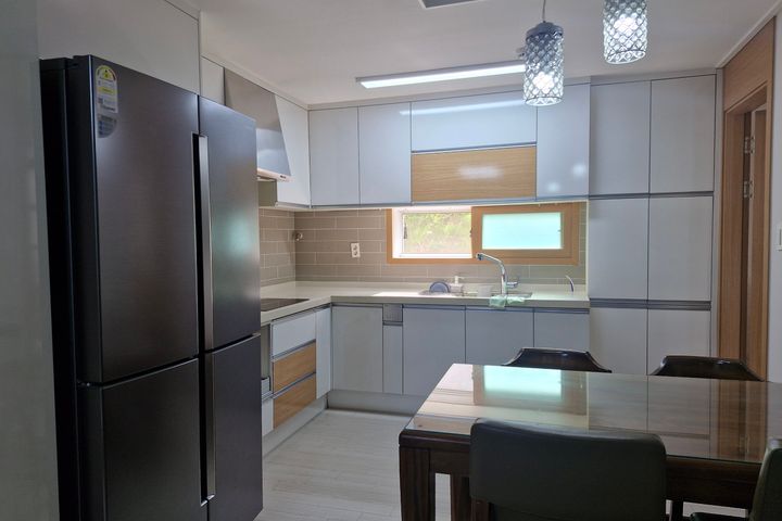 Fully furnished home with a stylish interior 10th image