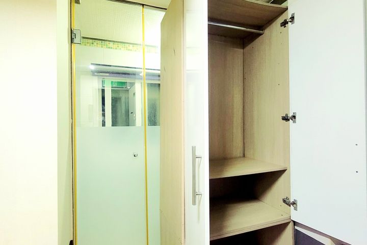 Unit 310: Studio-style room with an exterior  1th image