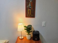 A cozy room with plenty of sunshine. 6th image