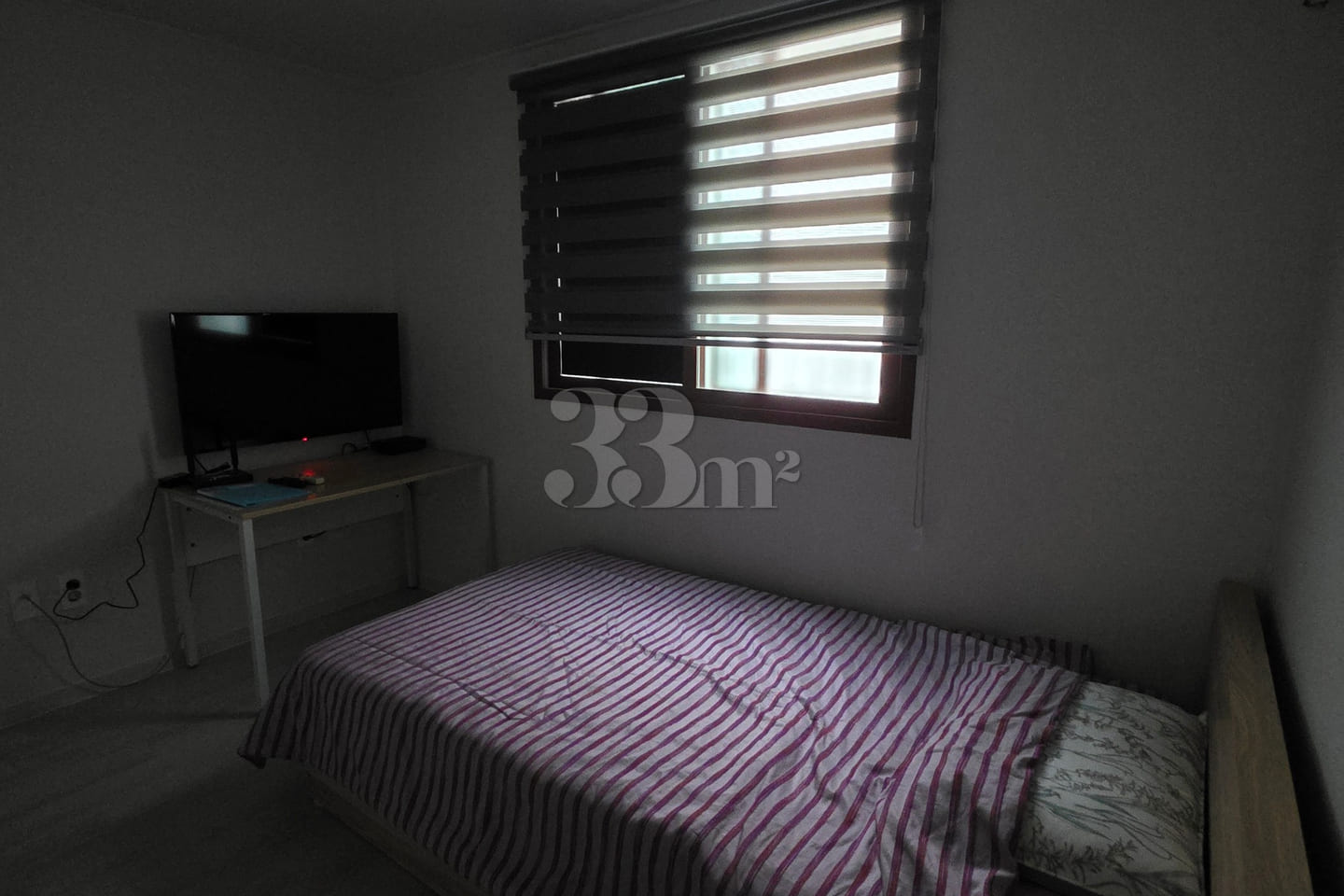 It is a neat studio apartment. 12th image