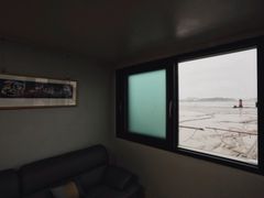 A house with a view of the sea and a lighthou 7th image