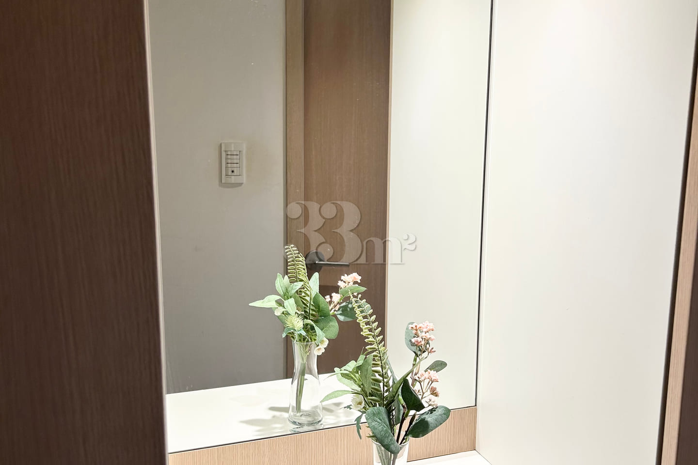 Two-bedroom duplex with a connecting path to  11th image