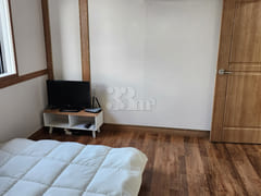 A room with a beautiful ocean view in the new 7th image