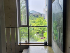 A room with a beautiful view and floor-to-cei 10th image