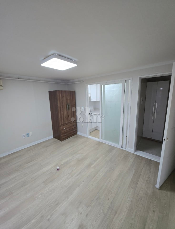 A stylish and neat studio apartment 1th image
