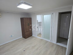 A stylish and neat studio apartment 1th image