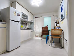A low-rise apartment building in a quiet, pea 0th image