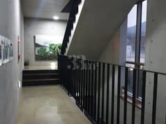 A room with a beautiful view and floor-to-cei 7th image