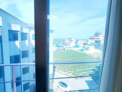 One-month stay at a beachfront duplex with a 19th image