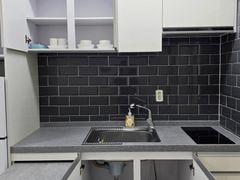 Clean, fully-furnished studio apartment 2th image
