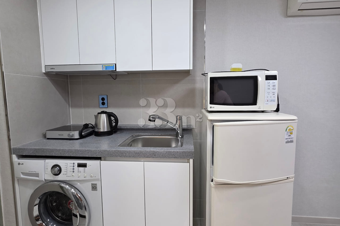 It is a neat studio apartment. 4th image