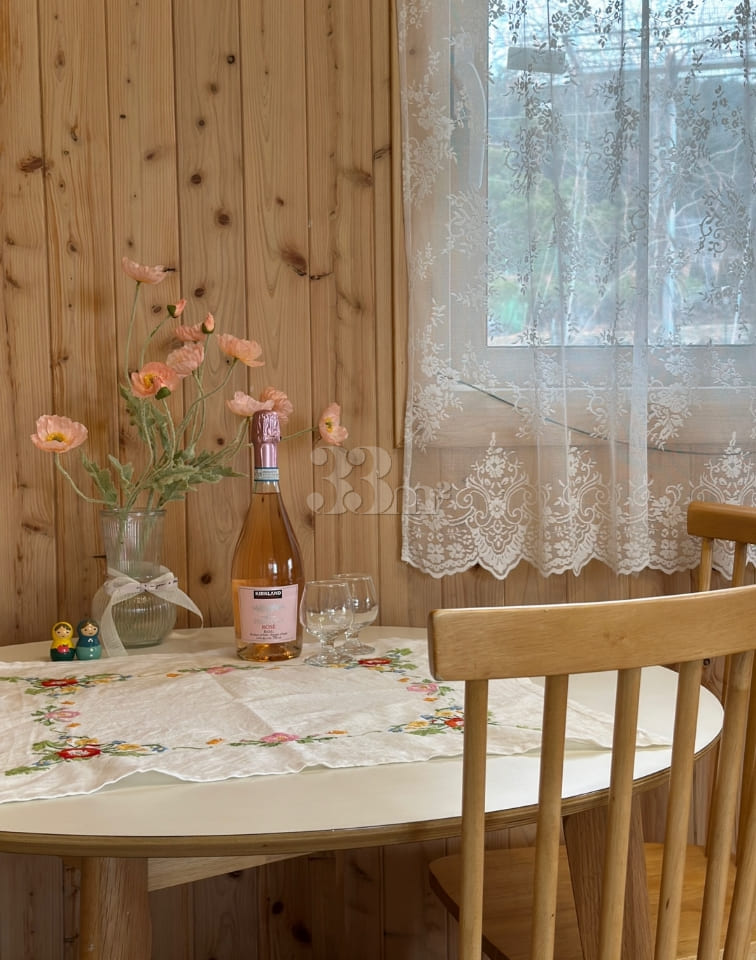 A room with a pretty garden in the forest. 10th image