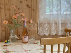 A room with a pretty garden in the forest. 10th image