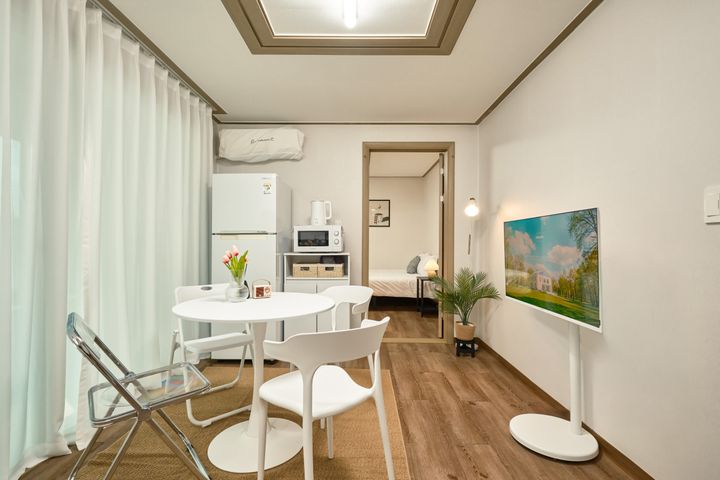 Fully furnished studio with a separate living 9th image