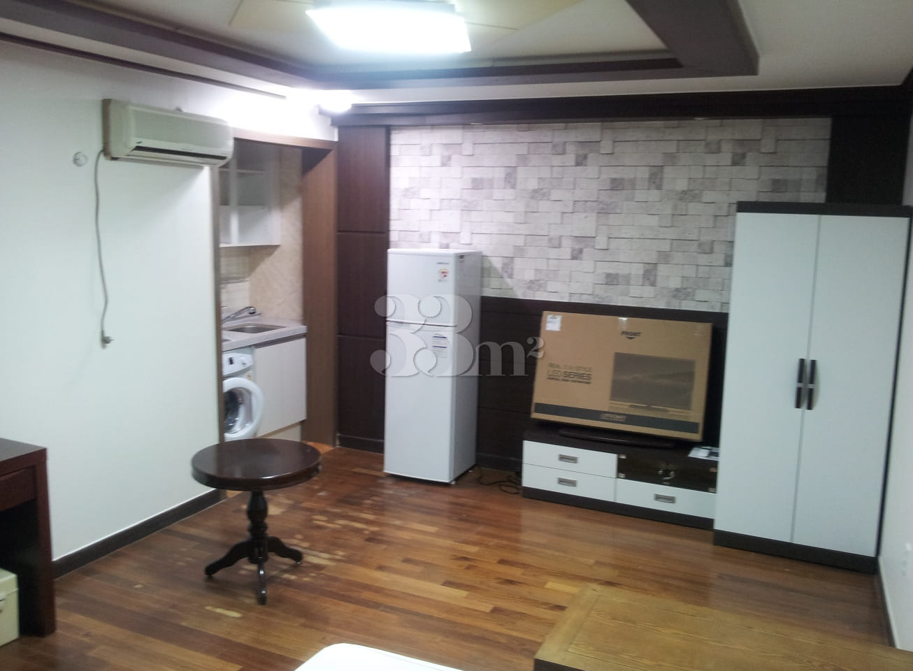 Two rooms, separate cooking and laundry facil 6th image