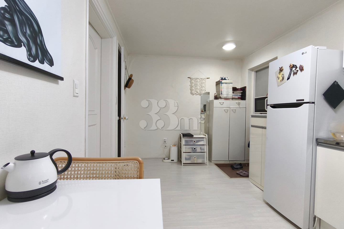 A low-rise apartment building in a quiet, pea 1th image