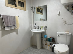 A room with a pretty garden in the forest. 8th image