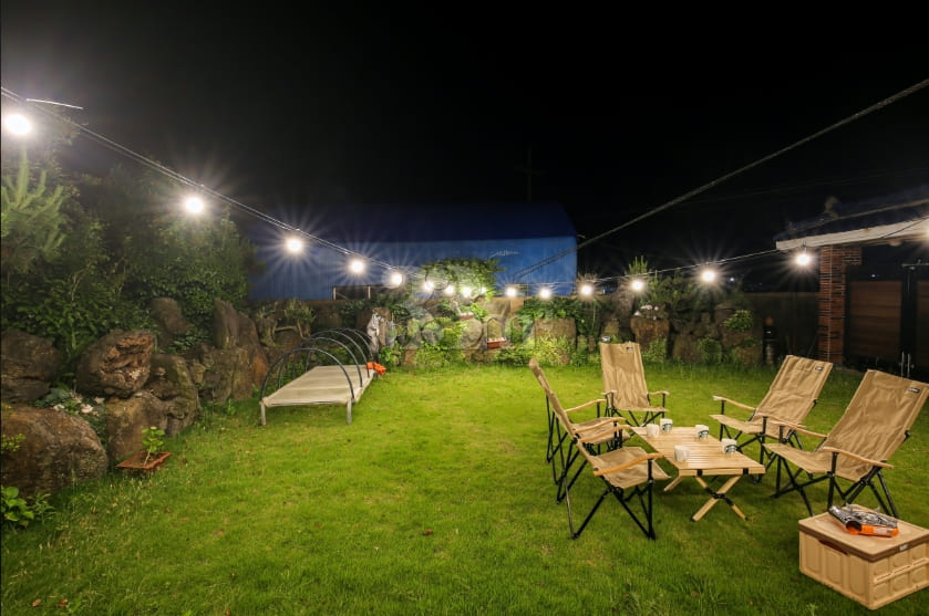 Rural accommodation with a lawn 1th image
