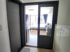 A room with a beautiful view and floor-to-cei 13th image