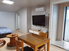 It's a clean two-story studio apartment. 4th image
