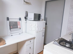 A room spacious enough for two people. 5th image