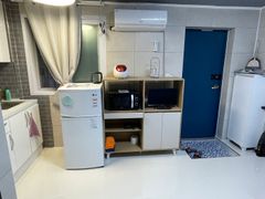 A clean studio apartment. 1th image